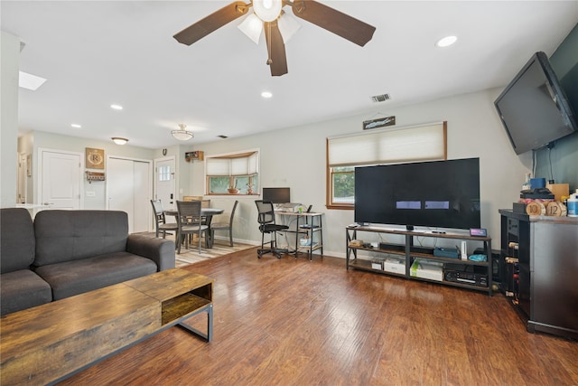 76 Cadman Ave, Babylon, NY 11702 - living area with ceiling fan, wood finished floors, and recessed lighting