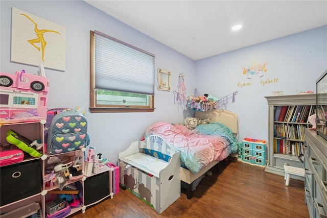 76 Cadman Ave, Babylon, NY 11702 - bedroom with wood finished floors and recessed lighting