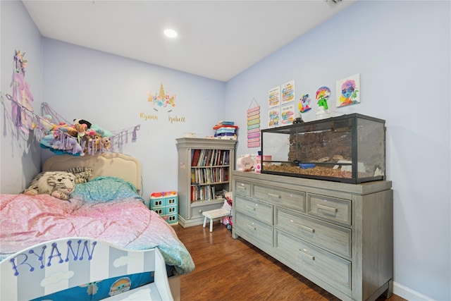 76 Cadman Ave, Babylon, NY 11702 - bedroom featuring dark wood-style flooring and recessed lighting