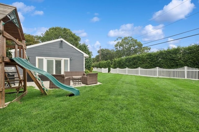76 Cadman Ave, Babylon, NY 11702 - fenced backyard with an outdoor hangout area