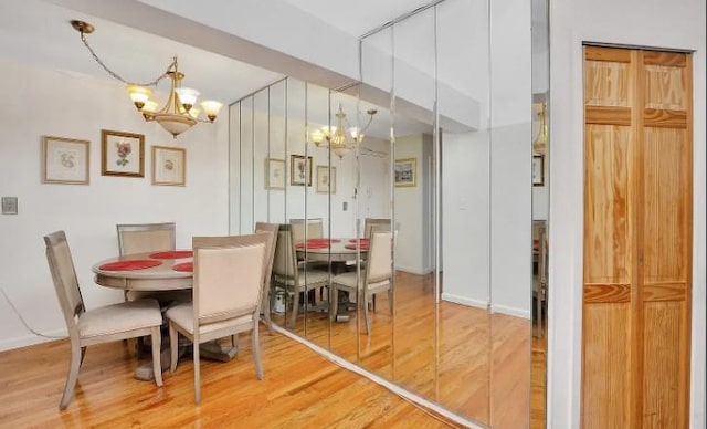 153-25 88th St Unit 1J, Howard Beach, NY 11414 - dining space with a chandelier and wood finished floors