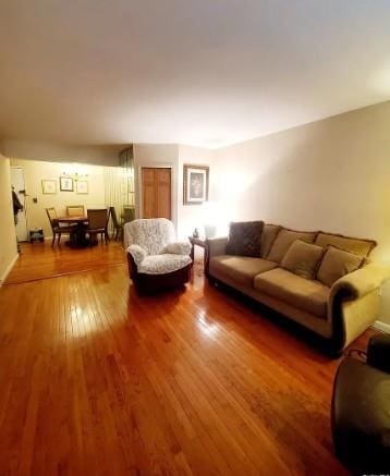 153-25 88th St Unit 1J, Howard Beach, NY 11414 - living room featuring hardwood / wood-style floors