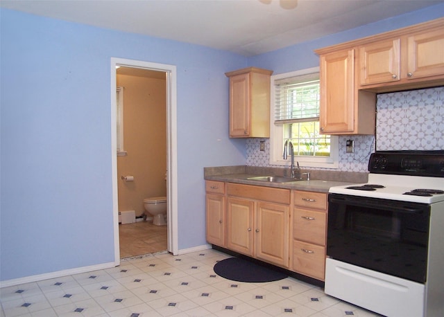 1439 Ocean Ave, Bohemia, NY 11716 - kitchen with light brown cabinetry, electric stove, and decorative backsplash