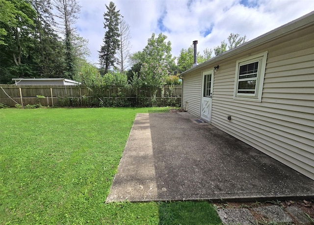1439 Ocean Ave, Bohemia, NY 11716 - fenced backyard with a patio area