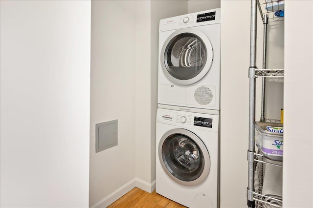 2287 Johnson Ave Unit 3A, Bronx, NY 10463 - laundry room featuring stacked washing machine and dryer and light wood-type flooring