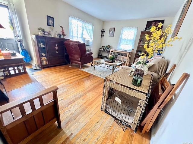 219-36 74th Ave Unit 323A1, Bayside, NY 11364 - living area with light wood-style floors