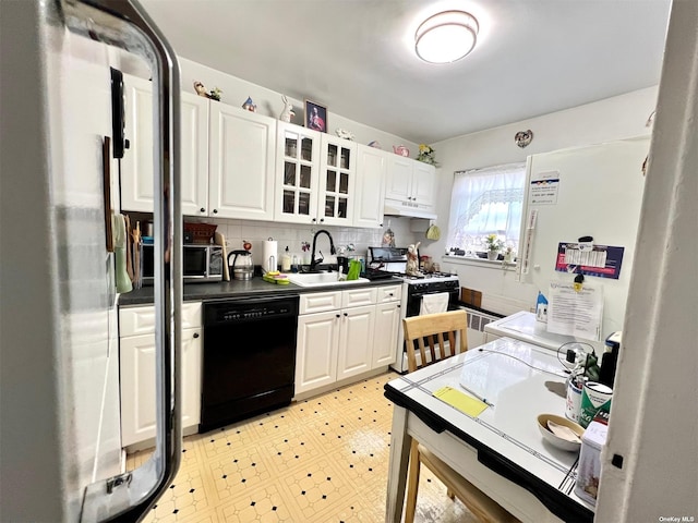 219-36 74th Ave Unit 323A1, Bayside, NY 11364 - kitchen featuring black appliances, white cabinets, glass insert cabinets, and under cabinet range hood