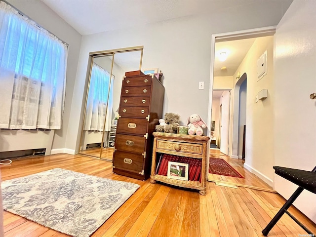 219-36 74th Ave Unit 323A1, Bayside, NY 11364 - living area featuring wood-type flooring and baseboards