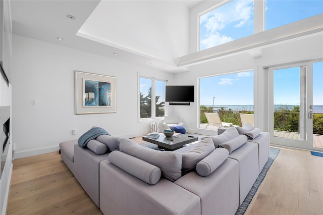 846 Dune Rd, Westhampton Dunes, NY 11978 - living area featuring light wood-style floors, recessed lighting, and a fireplace