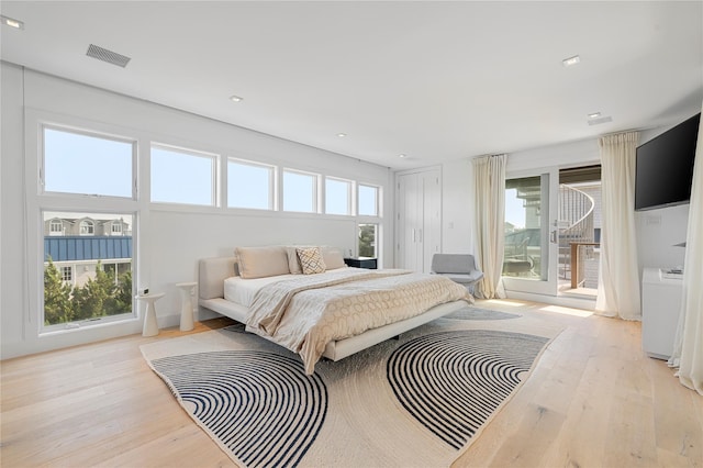 846 Dune Rd, Westhampton Dunes, NY 11978 - bedroom with hardwood / wood-style floors, access to exterior, and recessed lighting