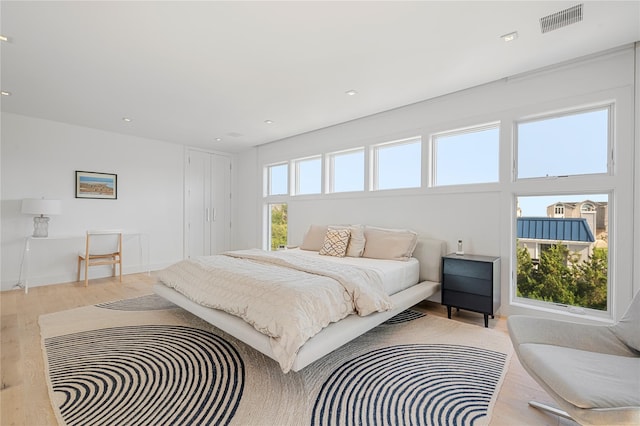 846 Dune Rd, Westhampton Dunes, NY 11978 - bedroom featuring wood finished floors and recessed lighting