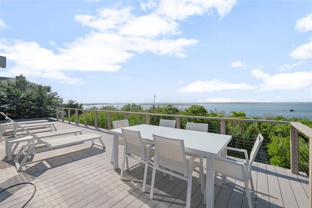 846 Dune Rd, Westhampton Dunes, NY 11978 - wooden deck with a water view and outdoor dining area