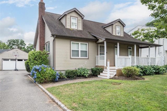 42 Bushwick St, Melville, NY 11747 - new england style home featuring an outdoor structure, a porch, a garage, roof with shingles, and a front yard