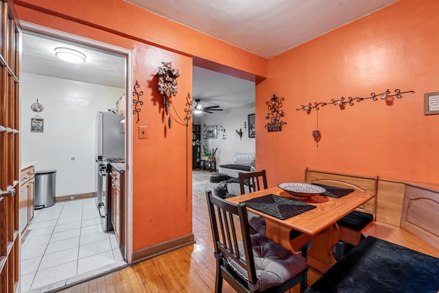 7910 34th Ave Unit 4J, Jackson Heights, NY 11372 - dining area featuring light wood-style floors and ceiling fan