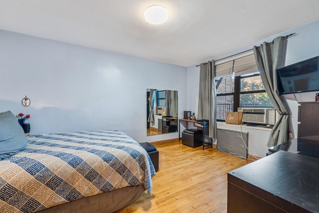 7910 34th Ave Unit 4J, Jackson Heights, NY 11372 - bedroom with light wood-style floors