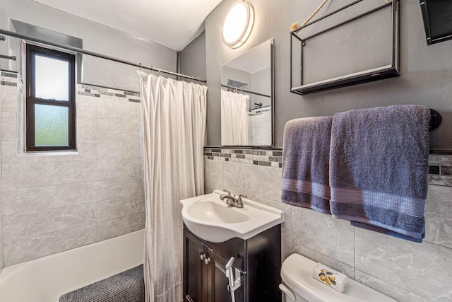 7910 34th Ave Unit 4J, Jackson Heights, NY 11372 - full bathroom with tile walls, vanity, and shower / bath combination with curtain