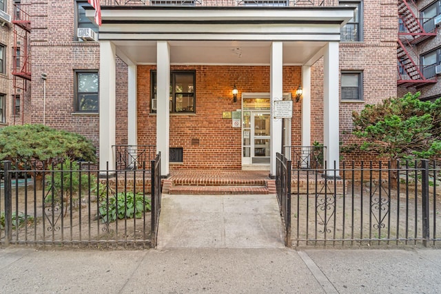 7910 34th Ave Unit 4J, Jackson Heights, NY 11372 - entrance to property with brick siding and covered porch