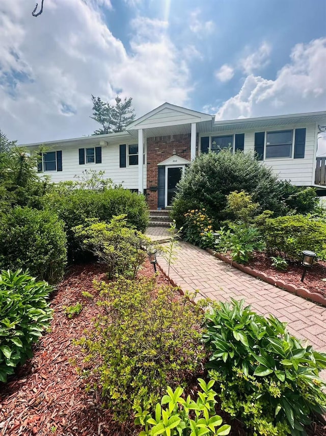 202 Nelson Ct, Syosset, NY 11791 - bi-level home with brick siding