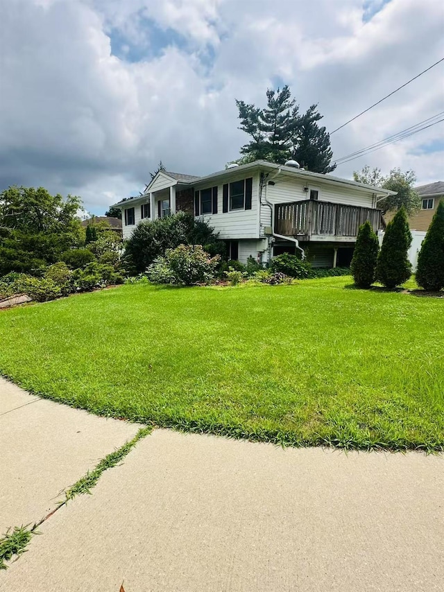 202 Nelson Ct, Syosset, NY 11791 - view of front of property with a front yard and a wooden deck