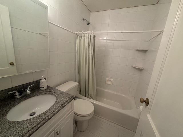 89 Hampton Ave, Albertson, NY 11507 - bathroom with shower / bath combination with curtain, vanity, tile patterned flooring, and tile walls