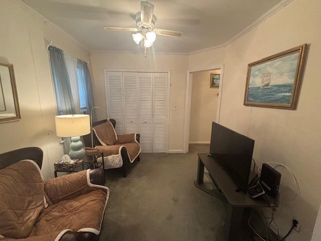 89 Hampton Ave, Albertson, NY 11507 - sitting room with carpet, a ceiling fan, and ornamental molding