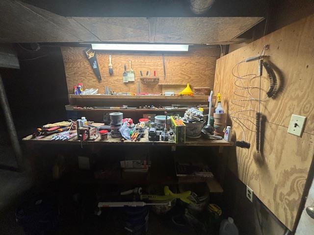89 Hampton Ave, Albertson, NY 11507 - basement with a workshop area