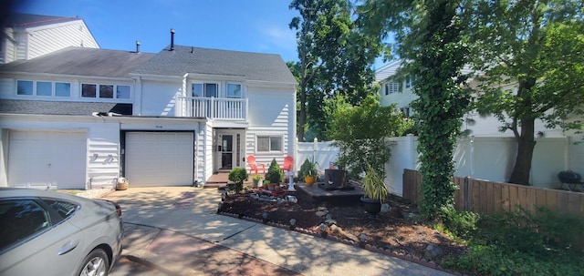 30 Chestnut Cir, Staten Island, NY 10312 - traditional-style home with a balcony, driveway, a garage, and roof with shingles