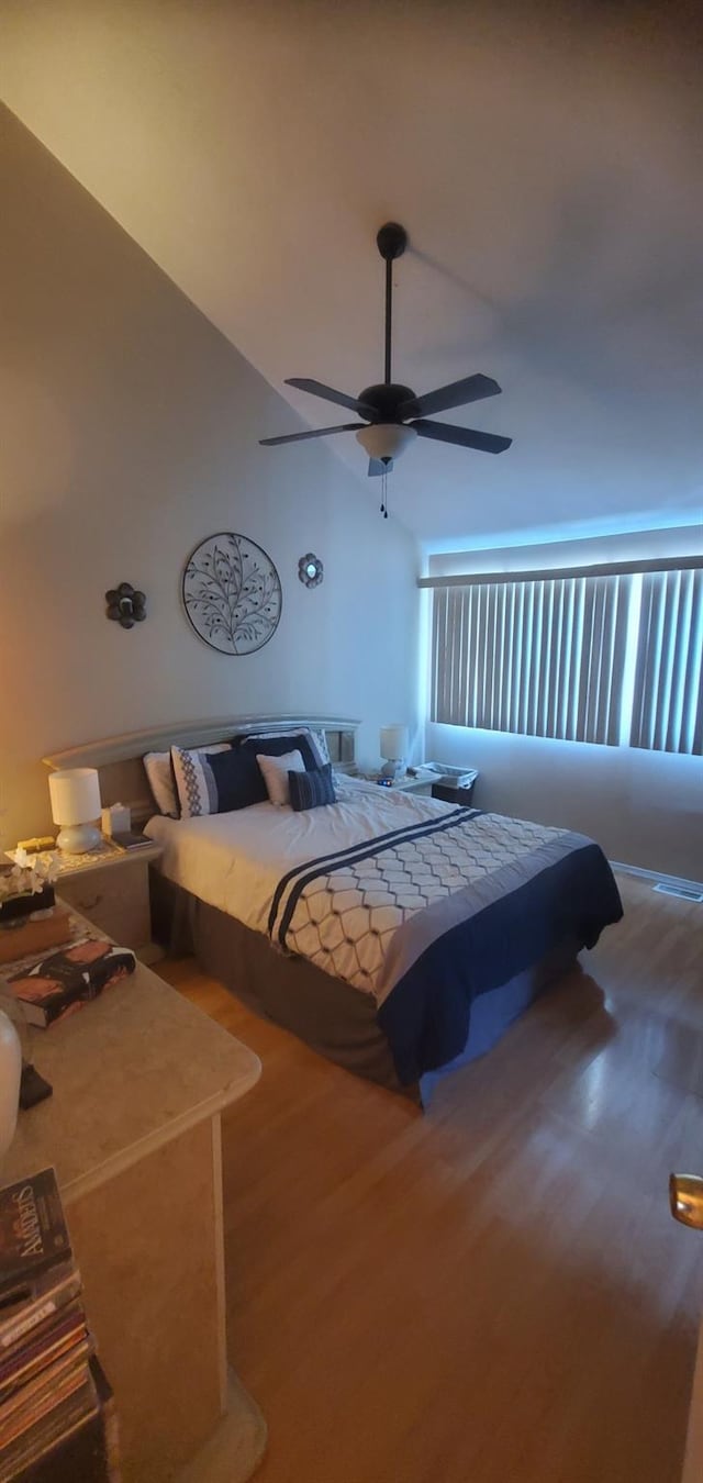 30 Chestnut Cir, Staten Island, NY 10312 - bedroom featuring wood finished floors, a ceiling fan, and lofted ceiling