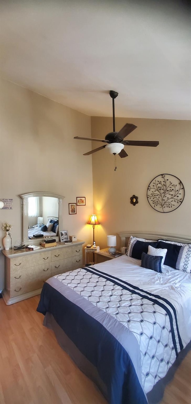 30 Chestnut Cir, Staten Island, NY 10312 - bedroom with light wood-style flooring and a ceiling fan