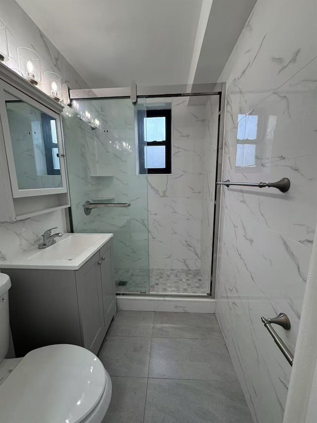 138-18 28th Rd Unit 1F, Flushing, NY 11354 - full bathroom featuring vanity and a marble finish shower