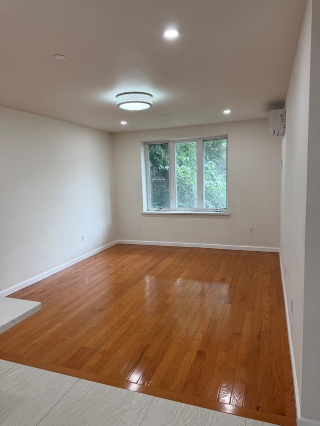 756 40th St Unit 2R, Brooklyn, NY 11232 - empty room featuring wood finished floors and recessed lighting