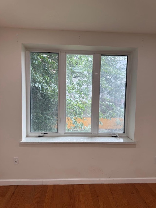 756 40th St Unit 2R, Brooklyn, NY 11232 - detailed view of baseboards and wood finished floors