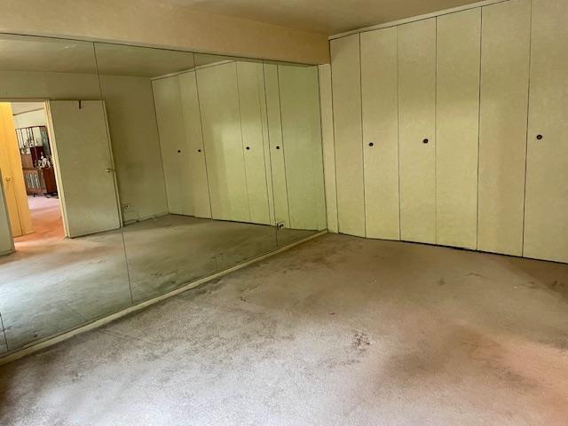 23-20 Bell Blvd Unit 2D, Bayside, NY 11360 - unfurnished bedroom with carpet floors