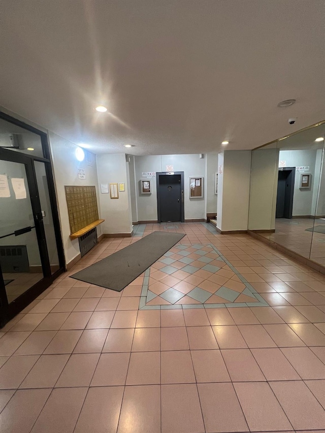 285 E 35th St Unit 2D, Brooklyn, NY 11203 - building lobby with recessed lighting