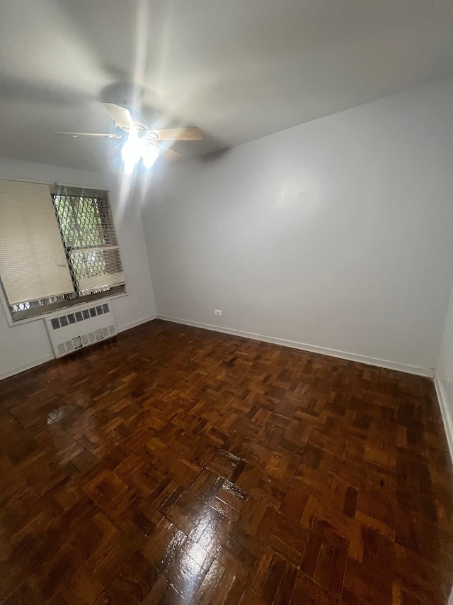 285 E 35th St Unit 2D, Brooklyn, NY 11203 - spare room with a ceiling fan and radiator