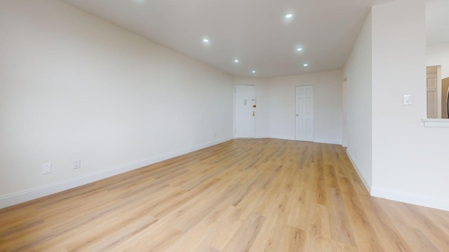 66-15 Thornton Pl Unit 6S, Rego Park, NY 11374 - unfurnished room featuring light wood-style floors and recessed lighting