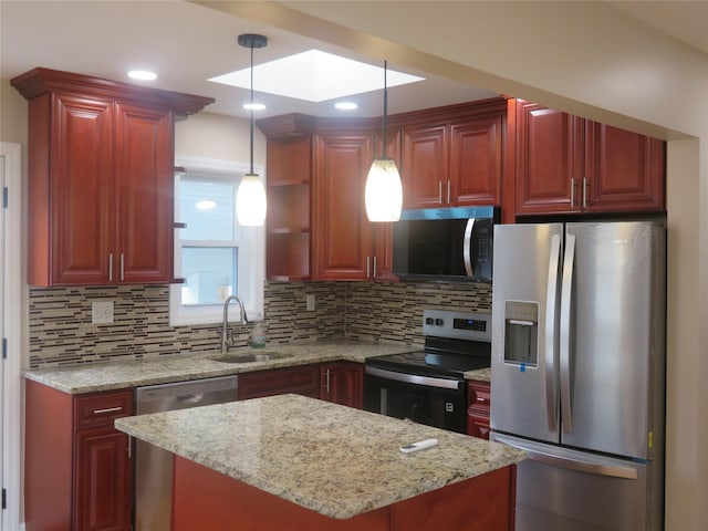 118 Muncy Ave, West Babylon, NY 11704 - kitchen featuring stainless steel appliances, a center island, decorative backsplash, and pendant lighting