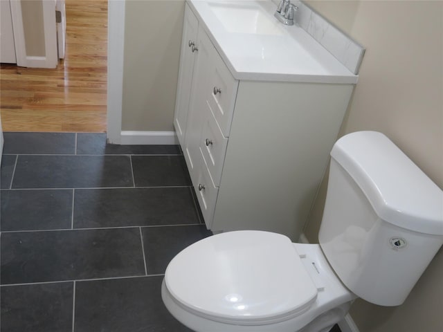118 Muncy Ave, West Babylon, NY 11704 - half bath featuring vanity and tile patterned flooring