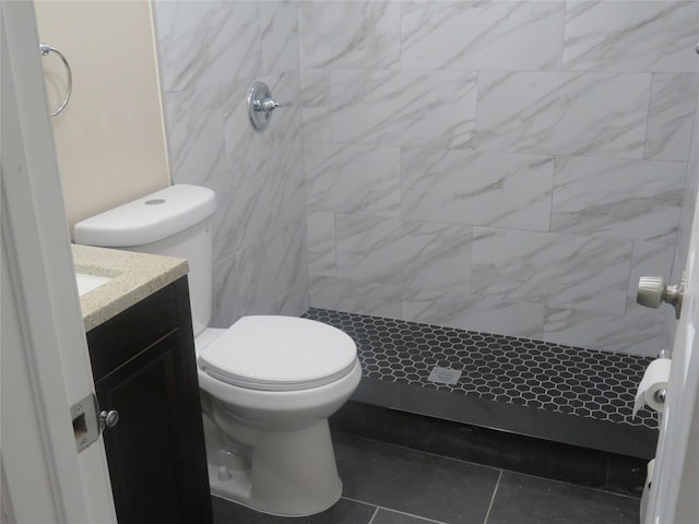118 Muncy Ave, West Babylon, NY 11704 - bathroom featuring a stall shower, vanity, and tile patterned floors