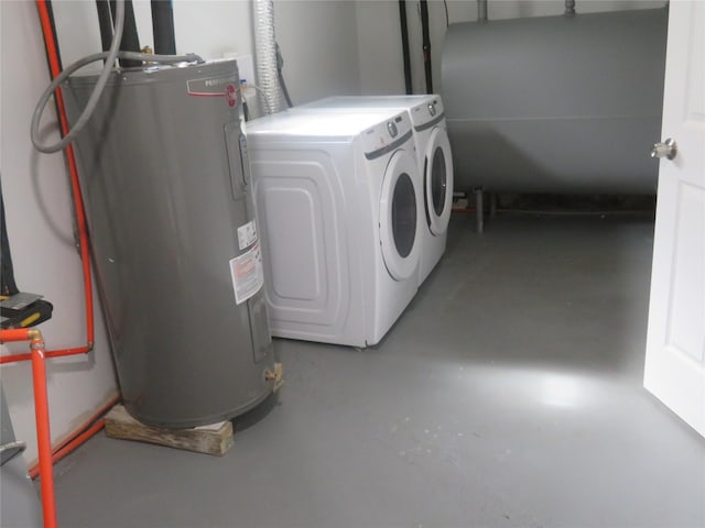 118 Muncy Ave, West Babylon, NY 11704 - laundry area with washing machine and clothes dryer, water heater, and heating fuel