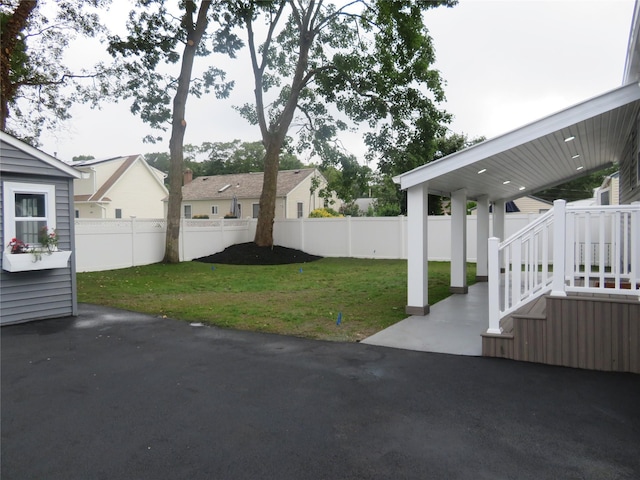 118 Muncy Ave, West Babylon, NY 11704 - fenced backyard featuring a patio