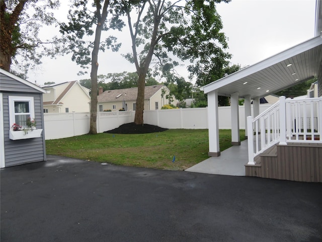 118 Muncy Ave, West Babylon, NY 11704 - fenced backyard featuring a patio area