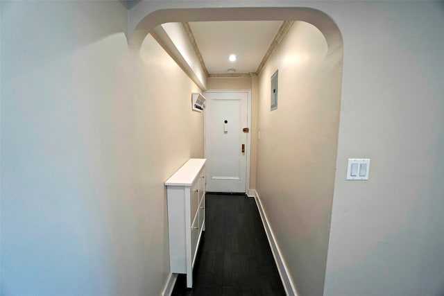 7281 113th St Unit 5F, Forest Hills, NY 11375 - hall with dark wood-type flooring, arched walkways, and crown molding