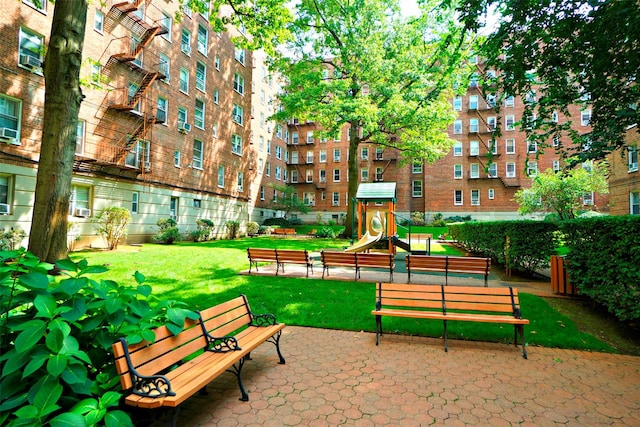 7281 113th St Unit 5F, Forest Hills, NY 11375 - view of community with a yard