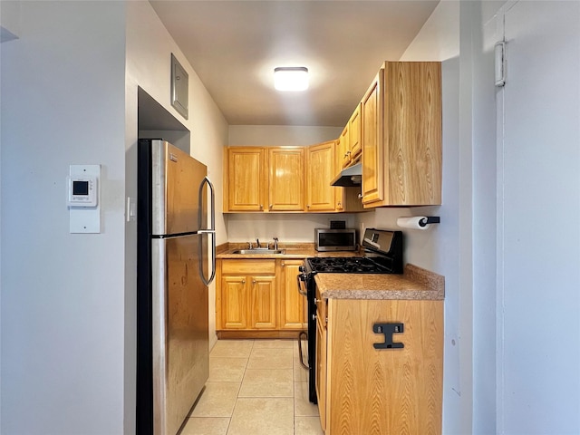 210-50 41st Ave Unit 6B, Bayside, NY 11361 - kitchen featuring appliances with stainless steel finishes, light brown cabinets, light tile patterned flooring, and light countertops