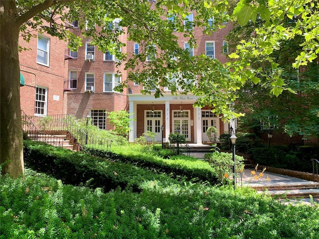 511 W 232nd St Unit E56, Bronx, NY 10463 - back of house with brick siding and french doors