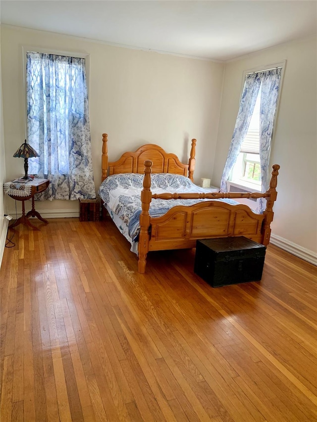 511 W 232nd St Unit E56, Bronx, NY 10463 - bedroom featuring light wood-type flooring and baseboards
