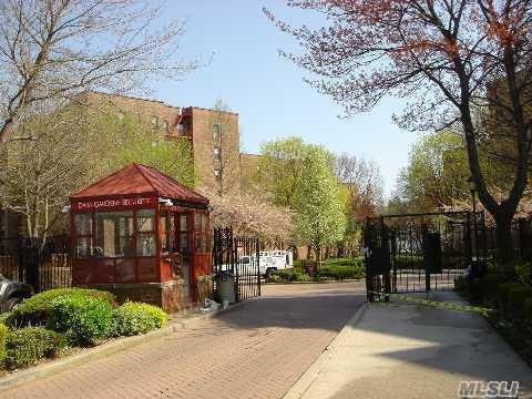 150-30 71st Ave Unit 4F, Kew Garden Hills, NY 11367 - surrounding community with a gate