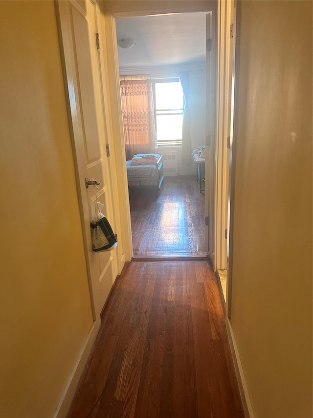 150-30 71st Ave Unit 4F, Kew Garden Hills, NY 11367 - hallway with dark wood-style floors and baseboards