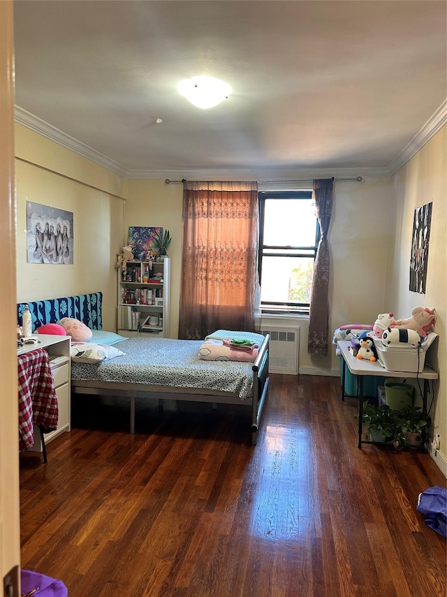 150-30 71st Ave Unit 4F, Kew Garden Hills, NY 11367 - bedroom with wood finished floors, radiator, and crown molding